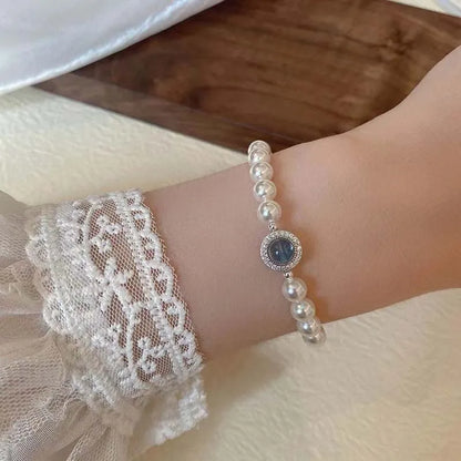 Elegant Pearl Bracelet with Blue Zircon Charm