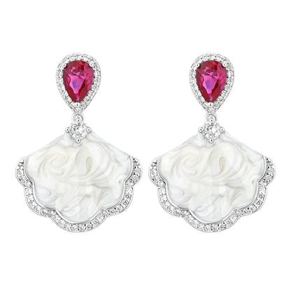 Luxury high-quality earrings made from natural shell and sparkling zircon.