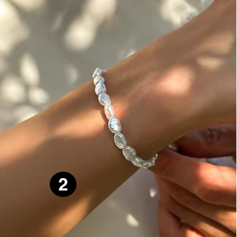 Elegant Pearl Bracelet with Blue Zircon Charm