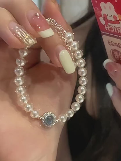 Elegant Pearl Bracelet with Blue Zircon Charm